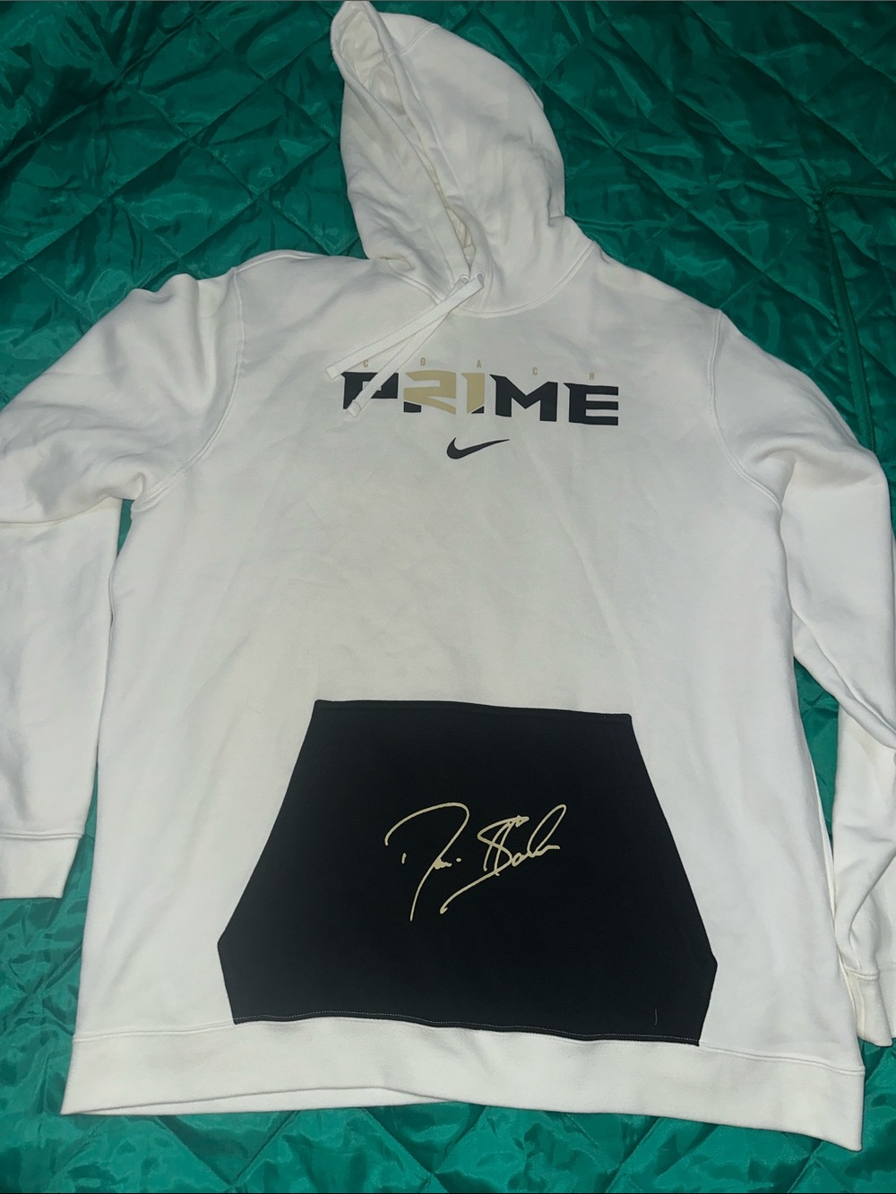 Nike White Hoodie with Black Pocket and Gold Accent